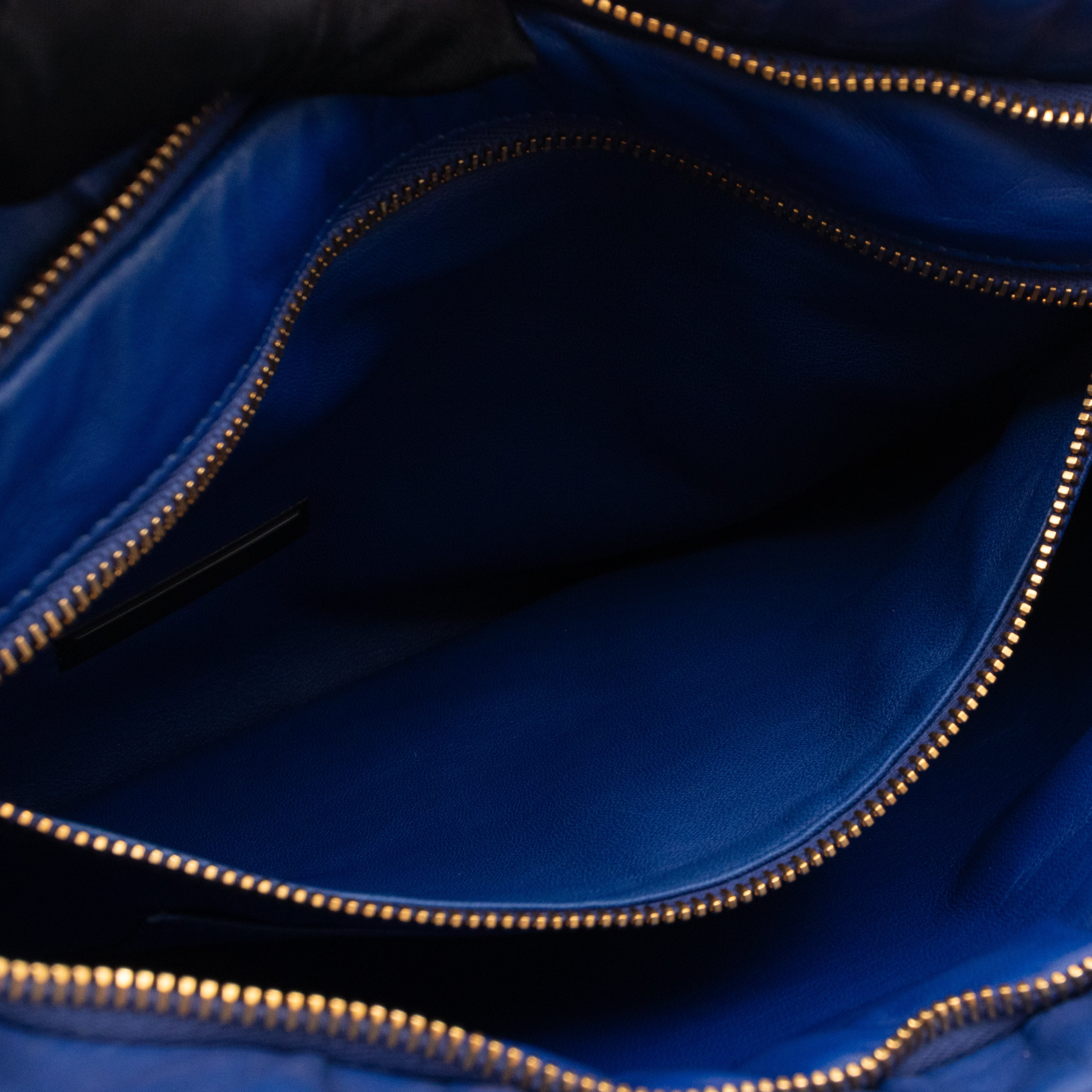 Ribbon Clutch Blue Leather
