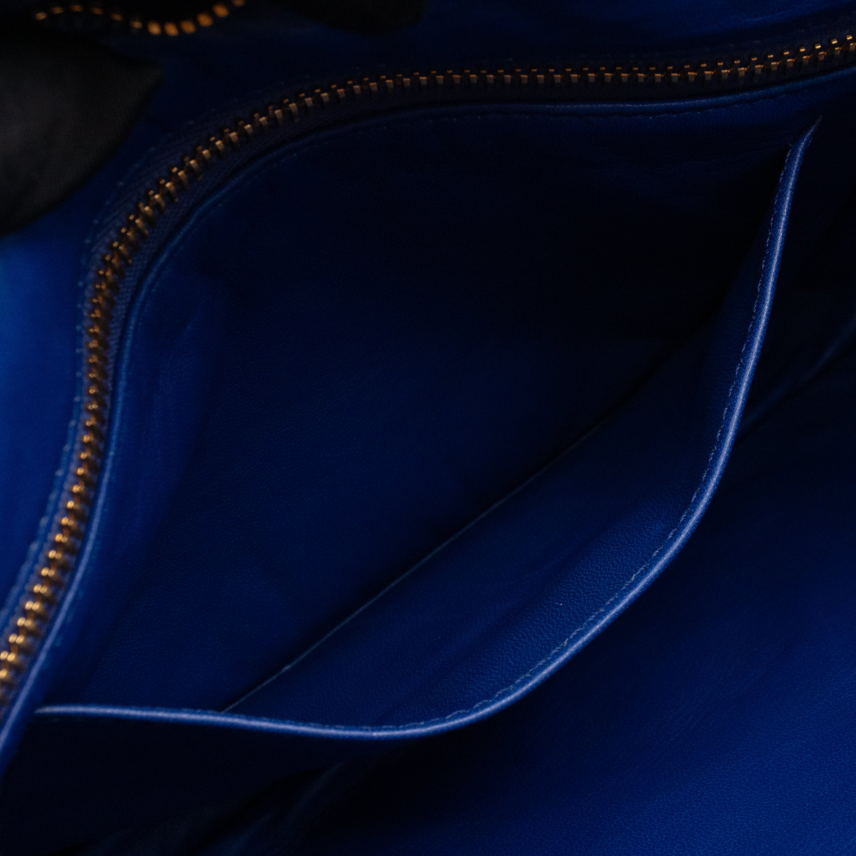 Ribbon Clutch Blue Leather