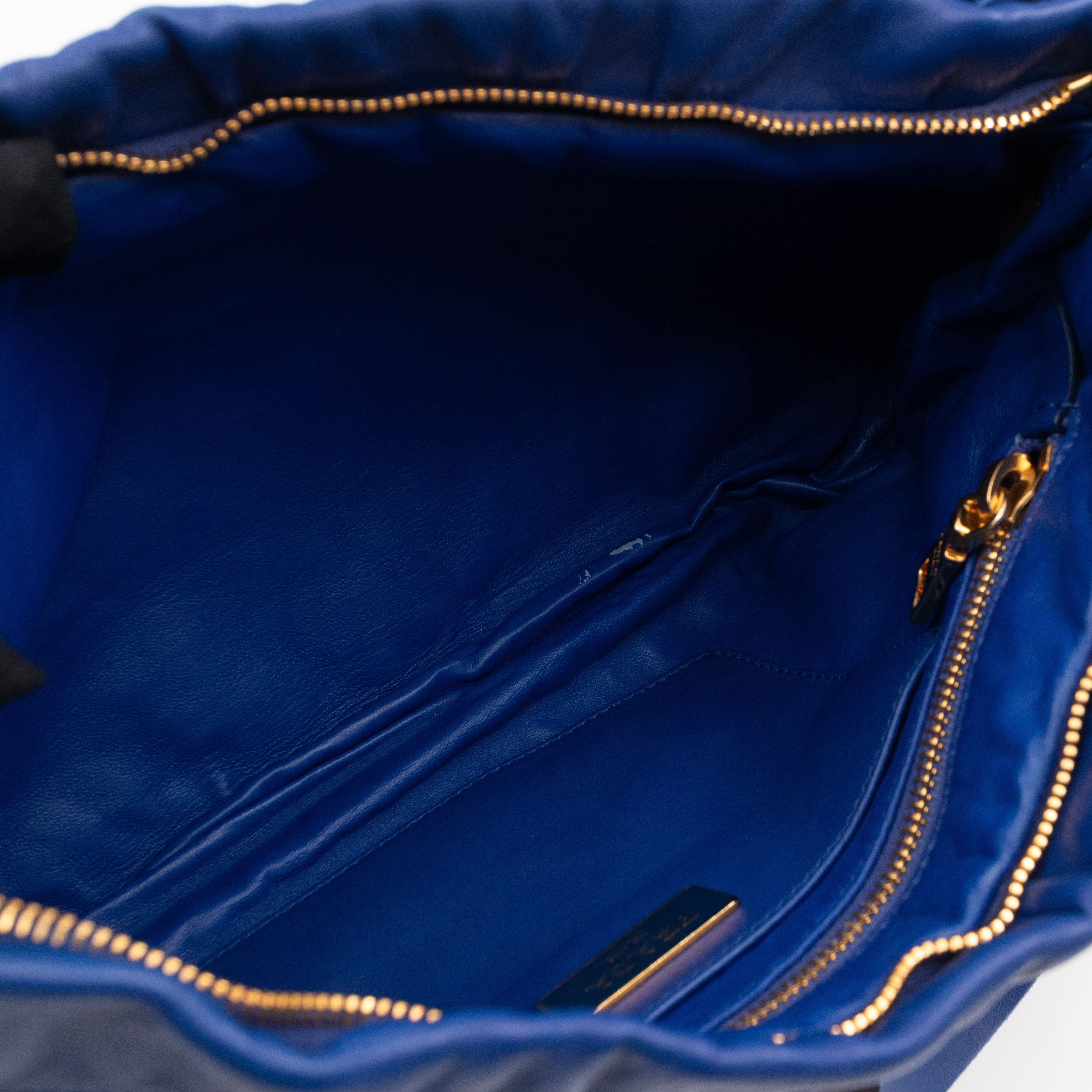 Ribbon Clutch Blue Leather