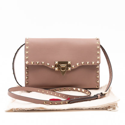 Small Rockstud Flip Lock Crossbody Bag Poudre Grainy Calfskin