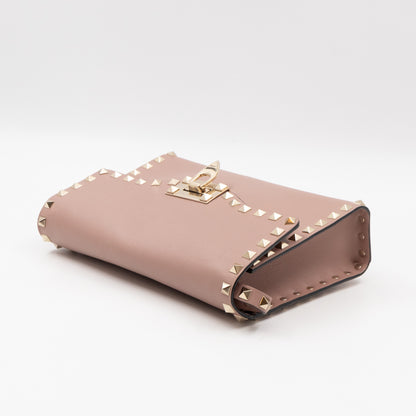 Small Rockstud Flip Lock Crossbody Bag Poudre Grainy Calfskin