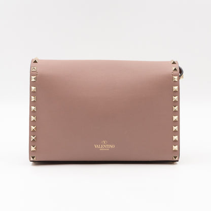 Small Rockstud Flip Lock Crossbody Bag Poudre Grainy Calfskin