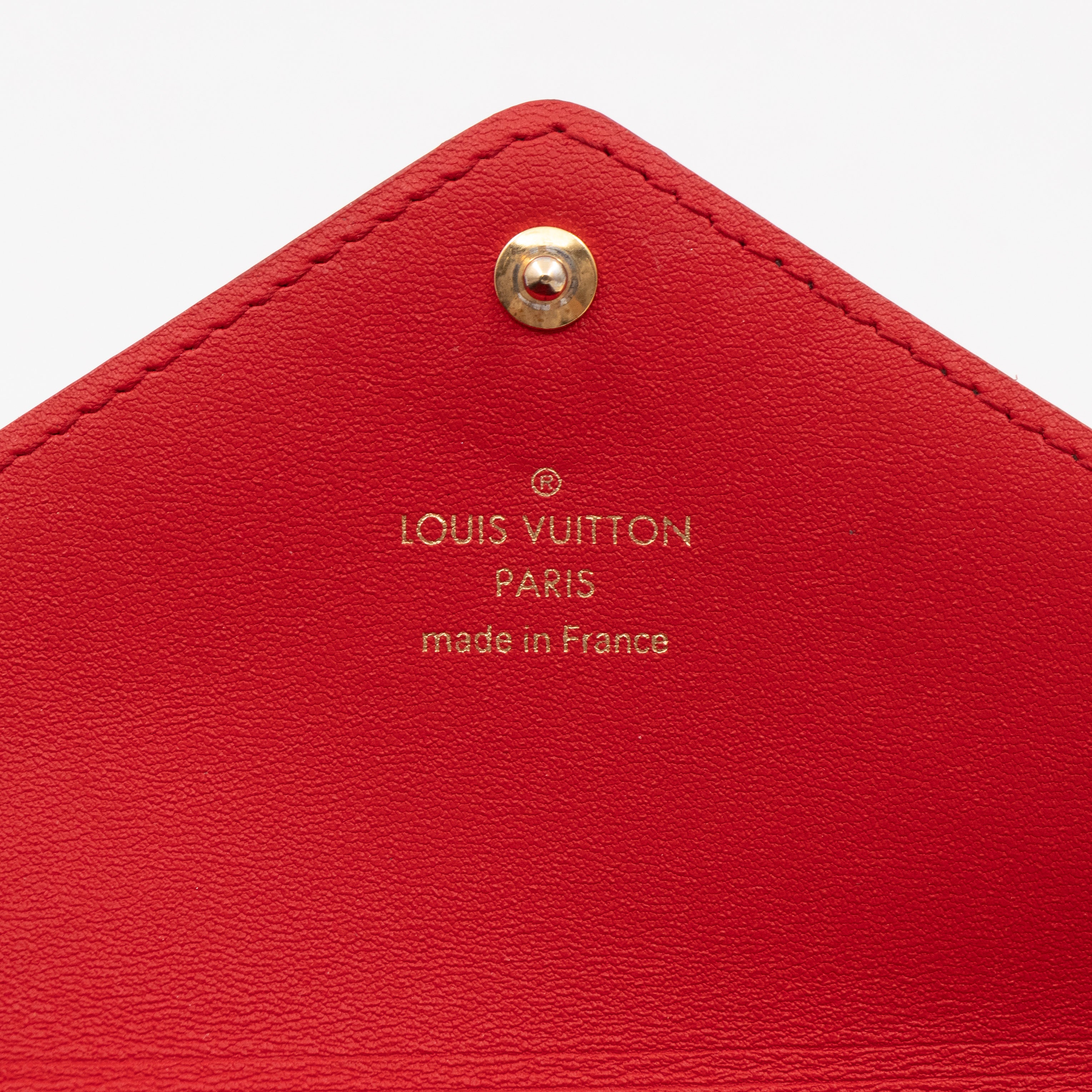 Pochette Kirigami Medium Monogram Red