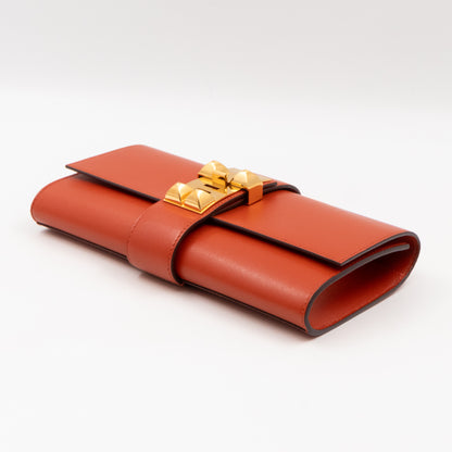 Medor 23 Clutch Orange Leather