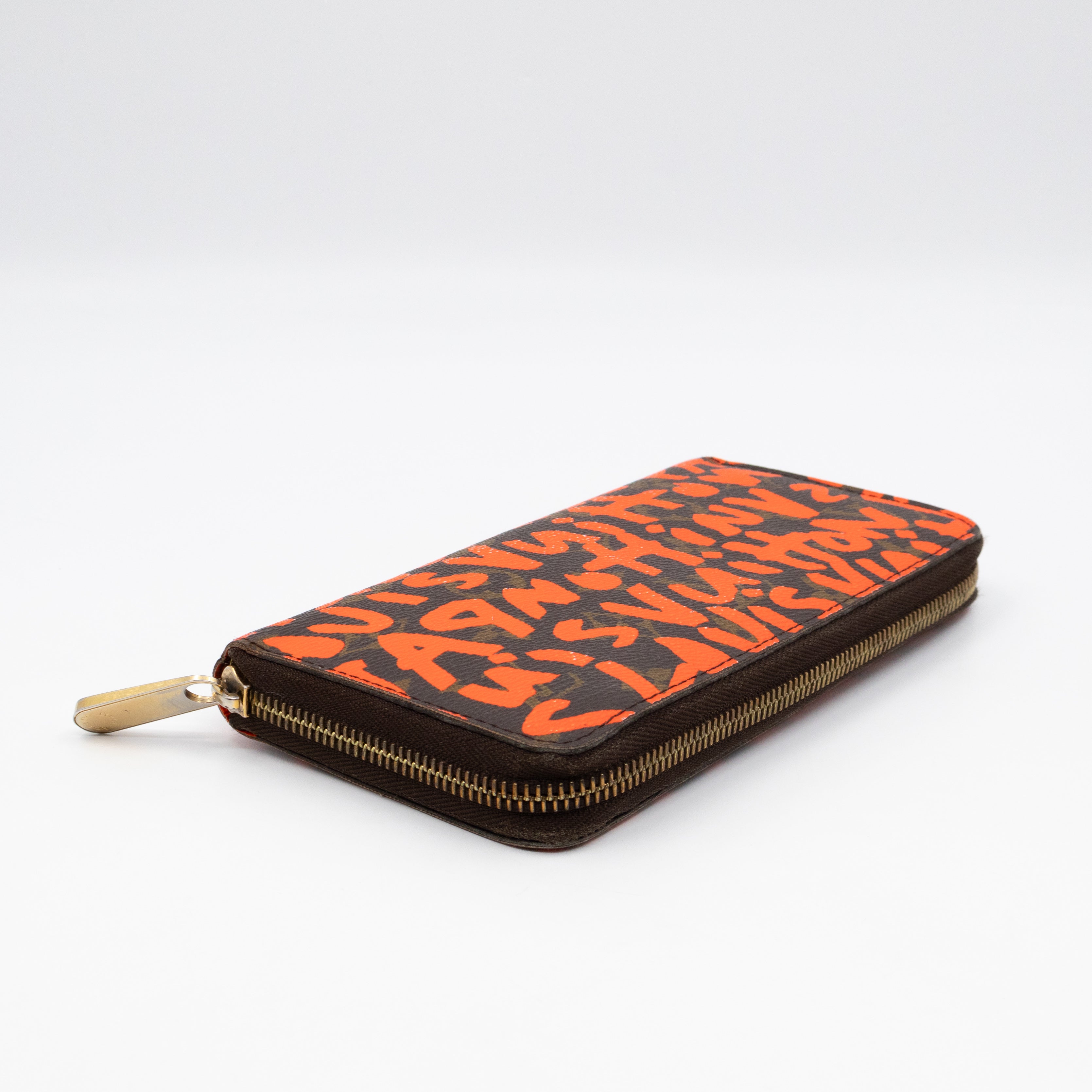 Zippy Wallet Monogram Graffiti Orange