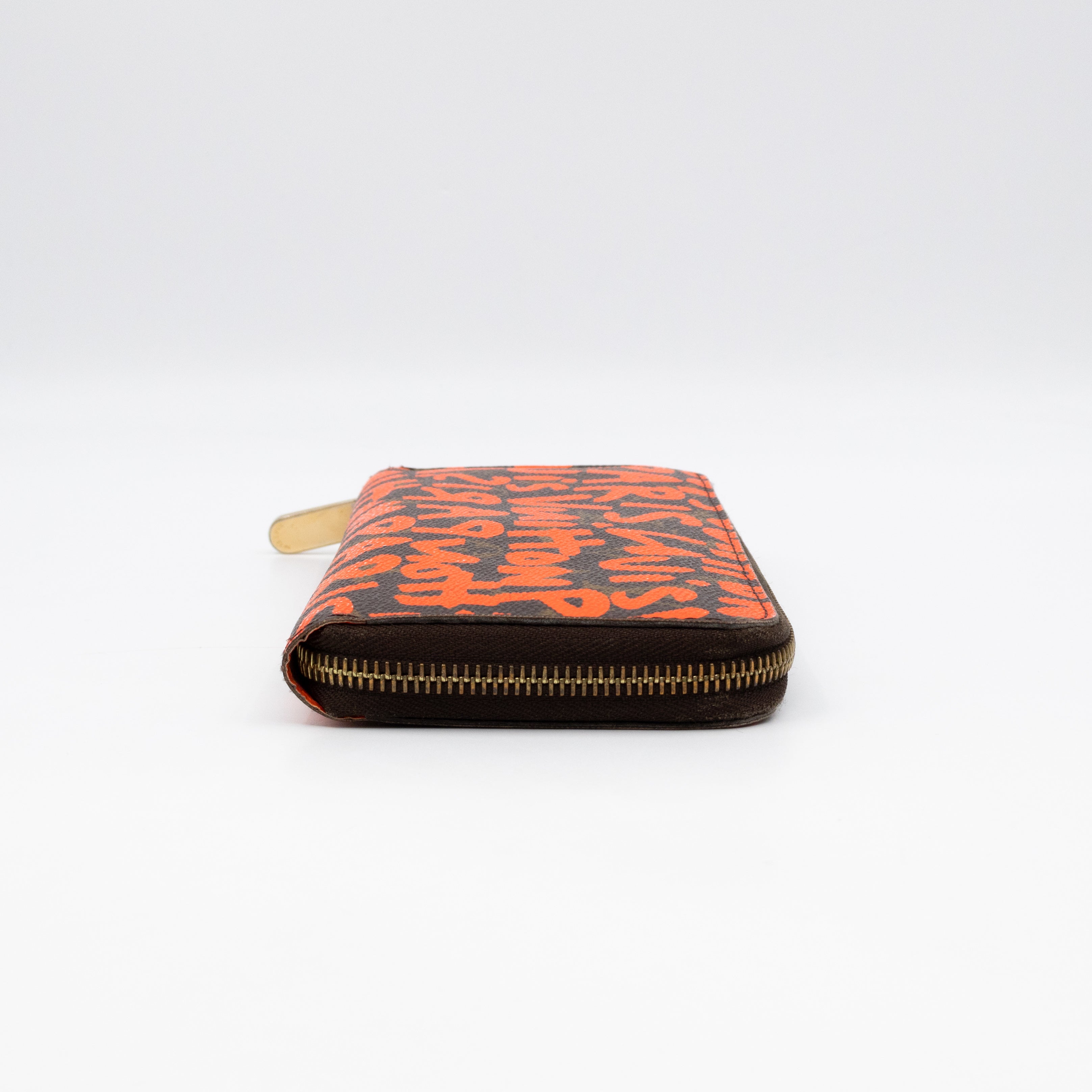 Zippy Wallet Monogram Graffiti Orange