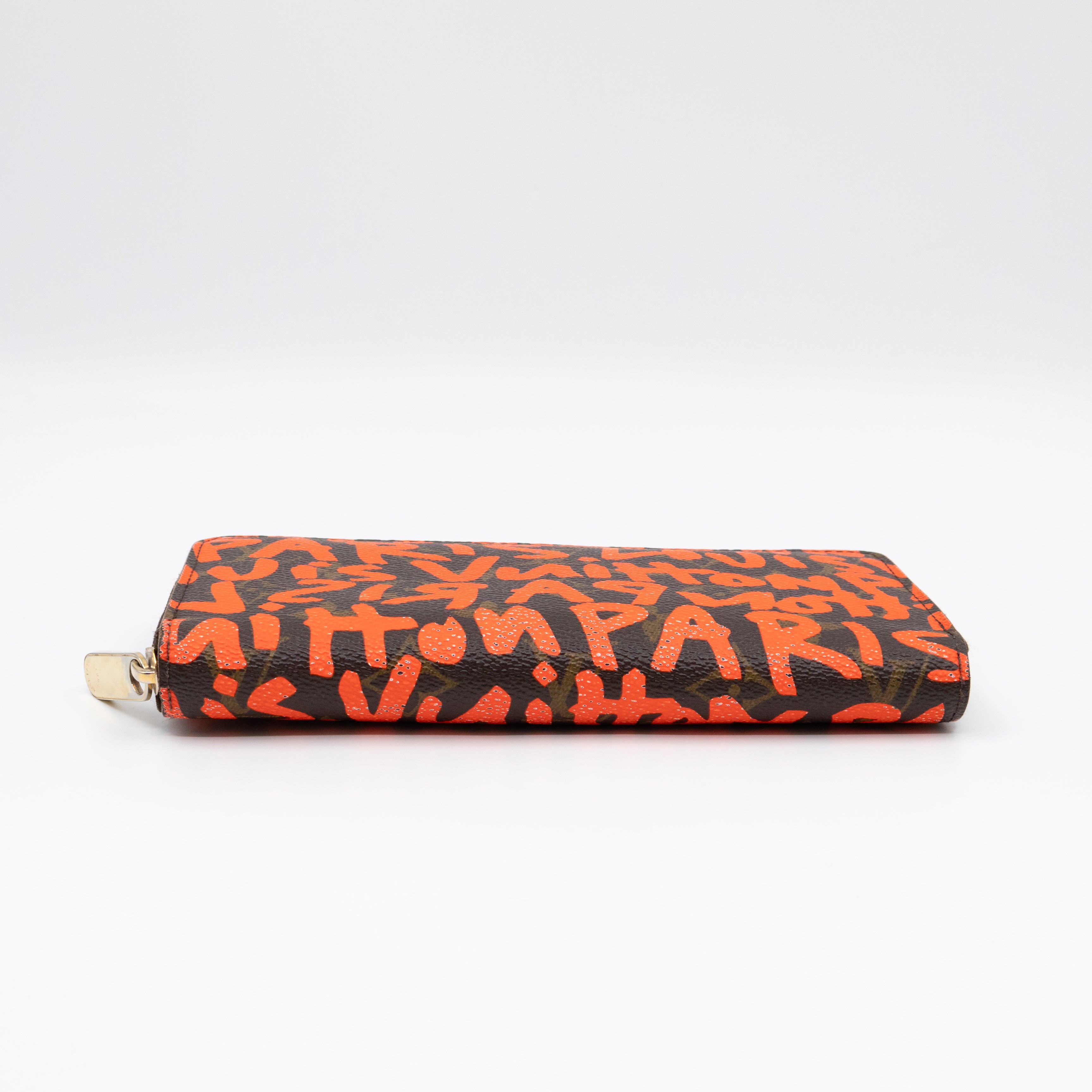 Zippy Wallet Monogram Graffiti Orange