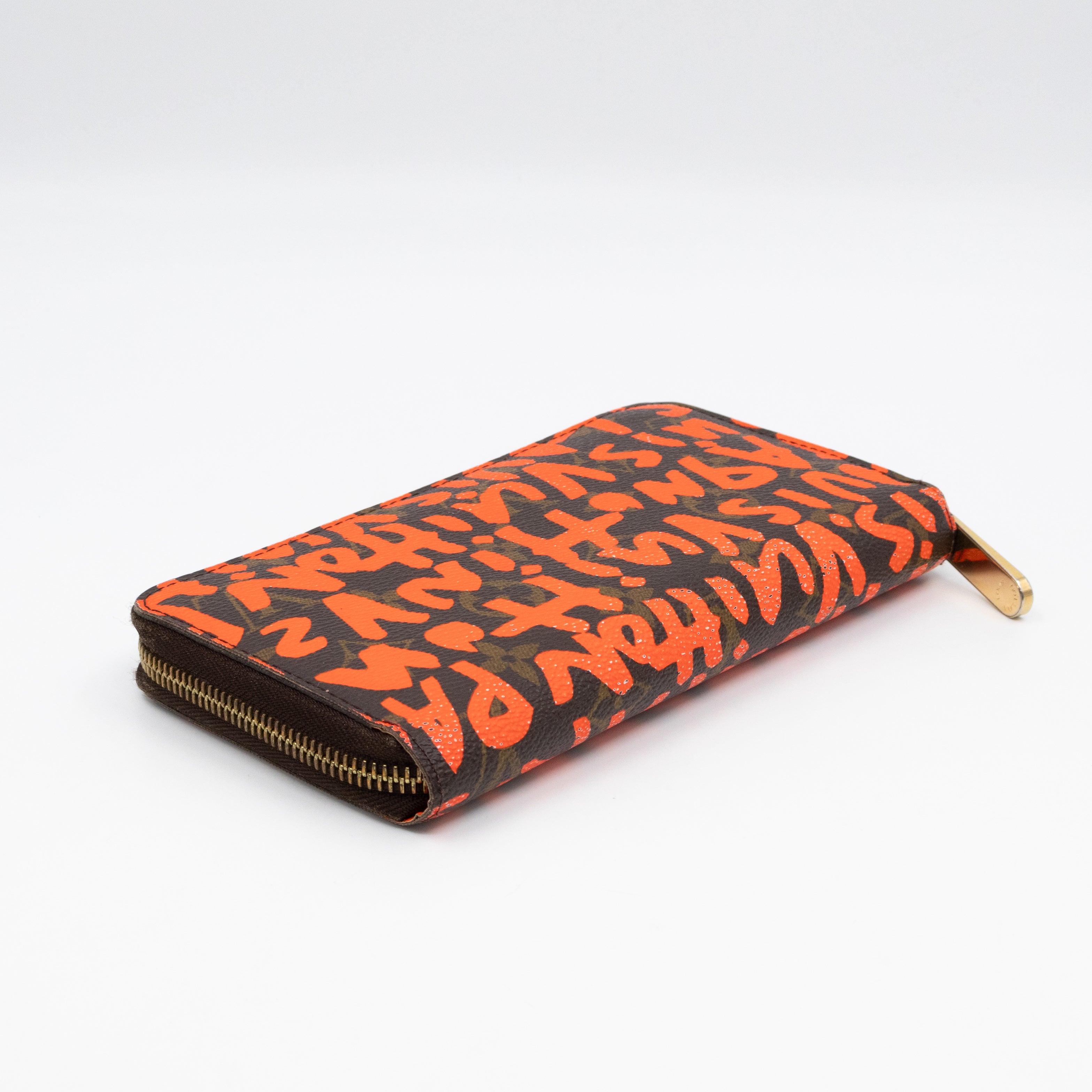 Zippy Wallet Monogram Graffiti Orange