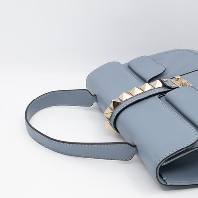 Large Rockstud Glam Lock Top Handle Bag Blue Leather