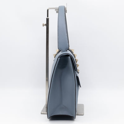 Large Rockstud Glam Lock Top Handle Bag Blue Leather