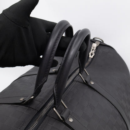Keepall 55 Bandouliere Onyx Damier Infini Leather