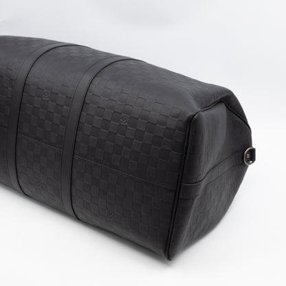 Keepall 55 Bandouliere Onyx Damier Infini Leather