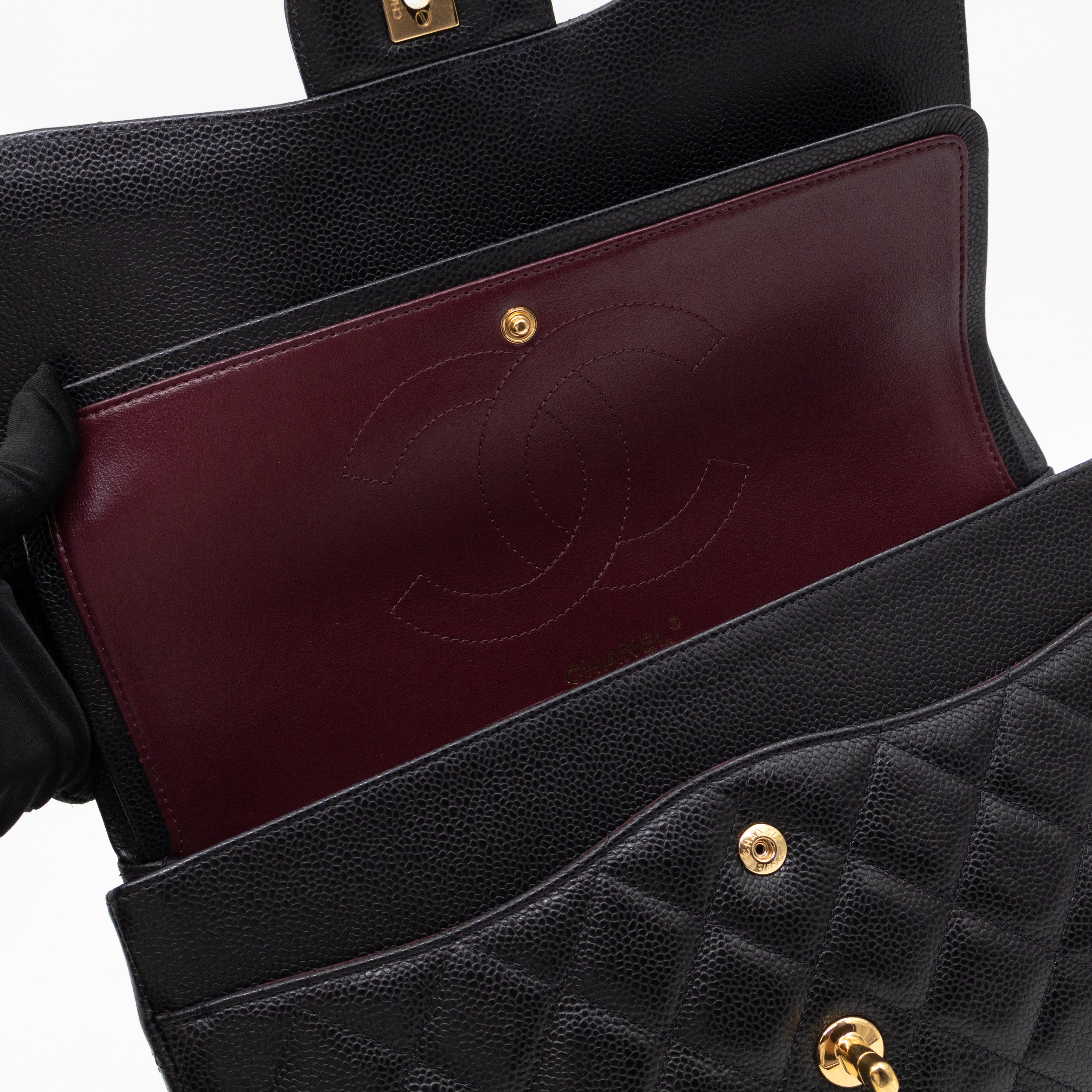 Classic Double Flap Jumbo Black Caviarskin Leather Gold
