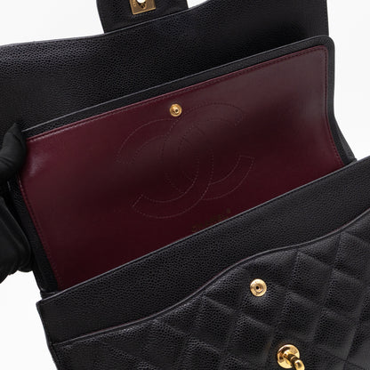 Classic Double Flap Jumbo Black Caviarskin Leather Gold