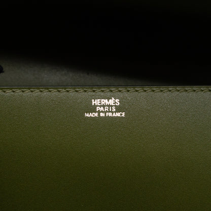 Medor 23 Clutch Green Leather