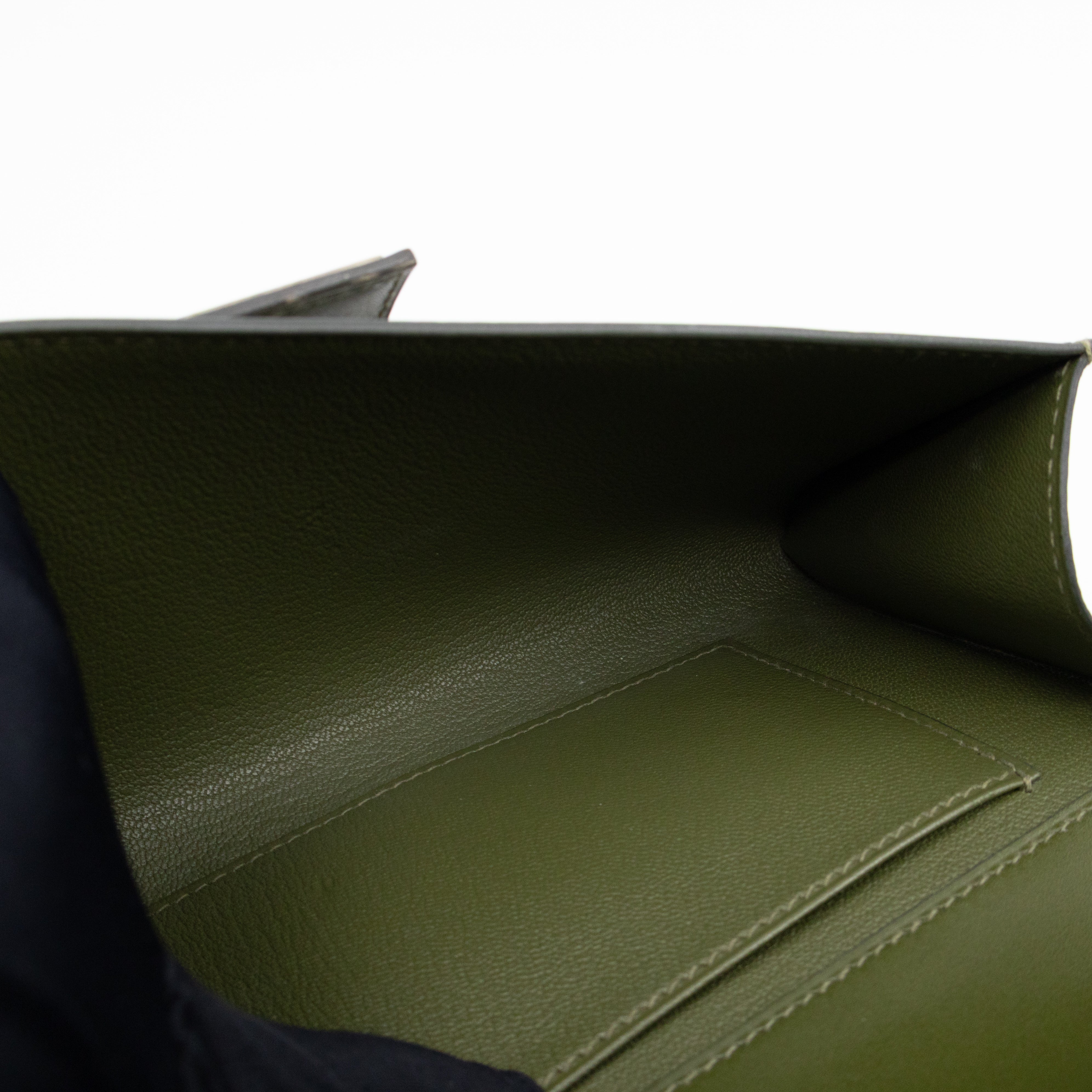 Medor 23 Clutch Green Leather