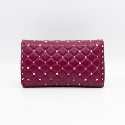 Rockstud Spike Crossbody Clutch Bag Fuchsia Leather