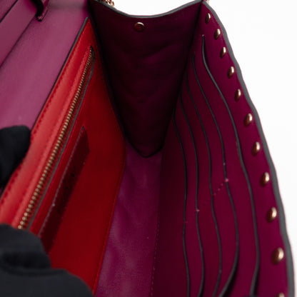 Rockstud Spike Crossbody Clutch Bag Fuchsia Leather