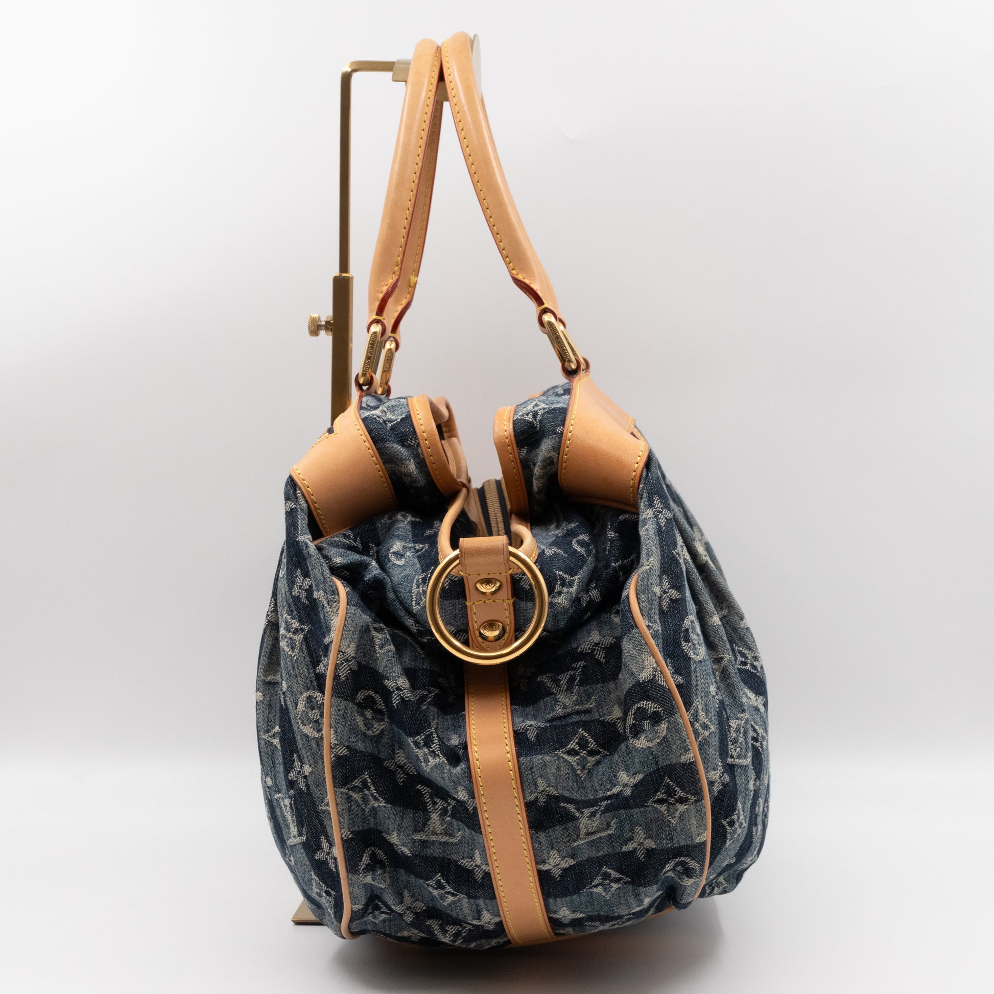Shop authentic Louis Vuitton Denim Porte Epaule Raye Cabas Bag at revogue  for just USD 1,400.00