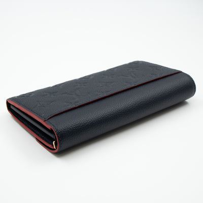 Sarah Wallet Monogram Empreinte Marine Rouge
