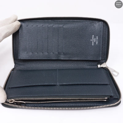 Zippy Vertical Monogram Cobalt Stripe Wallet