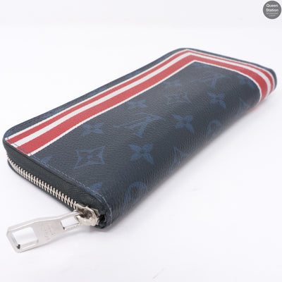 Zippy Vertical Monogram Cobalt Stripe Wallet