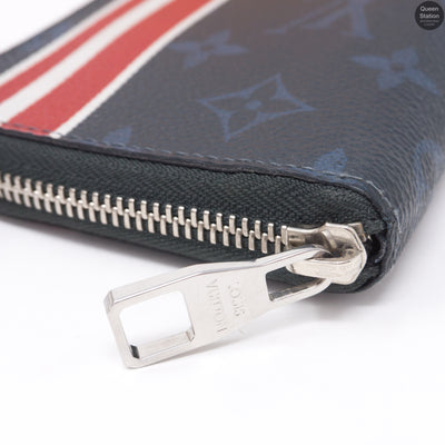 Zippy Vertical Monogram Cobalt Stripe Wallet