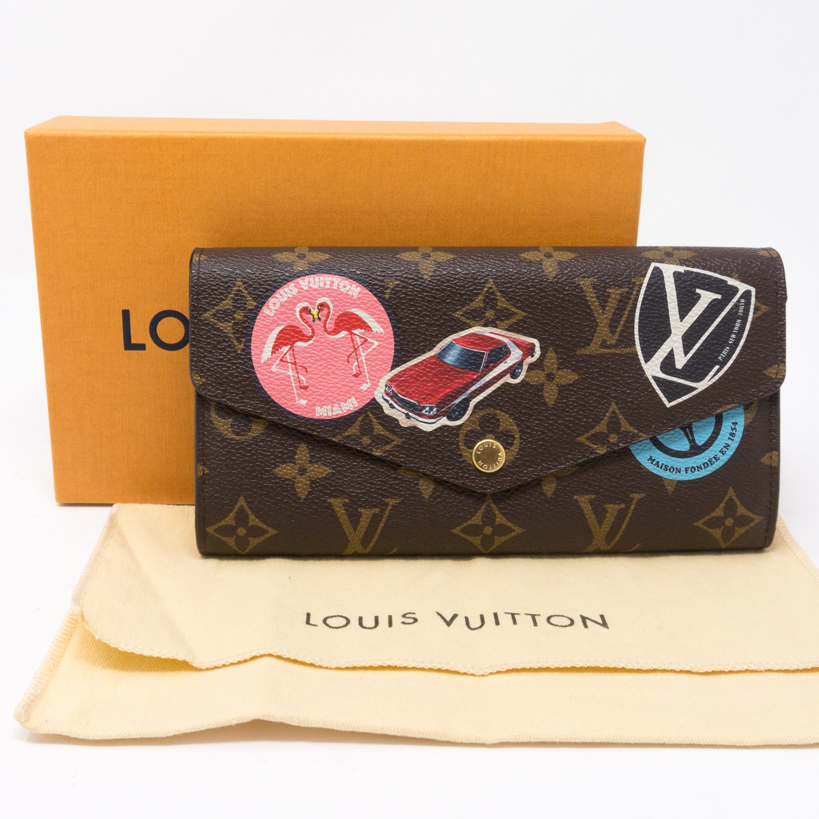 Sarah Wallet Monogram World Tour