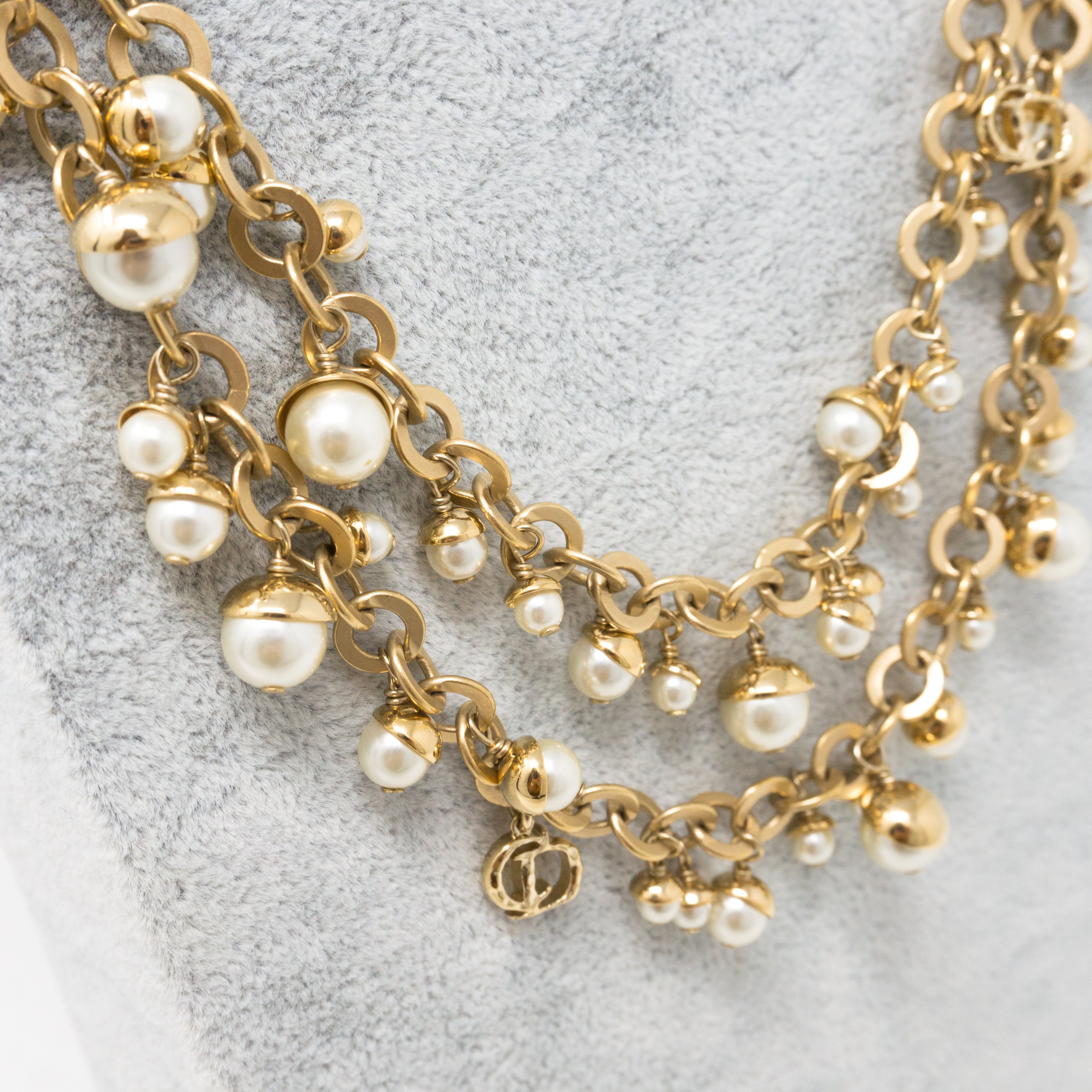Christian Dior pearl necklace with gold DIOR and stars  LuxuryPromise