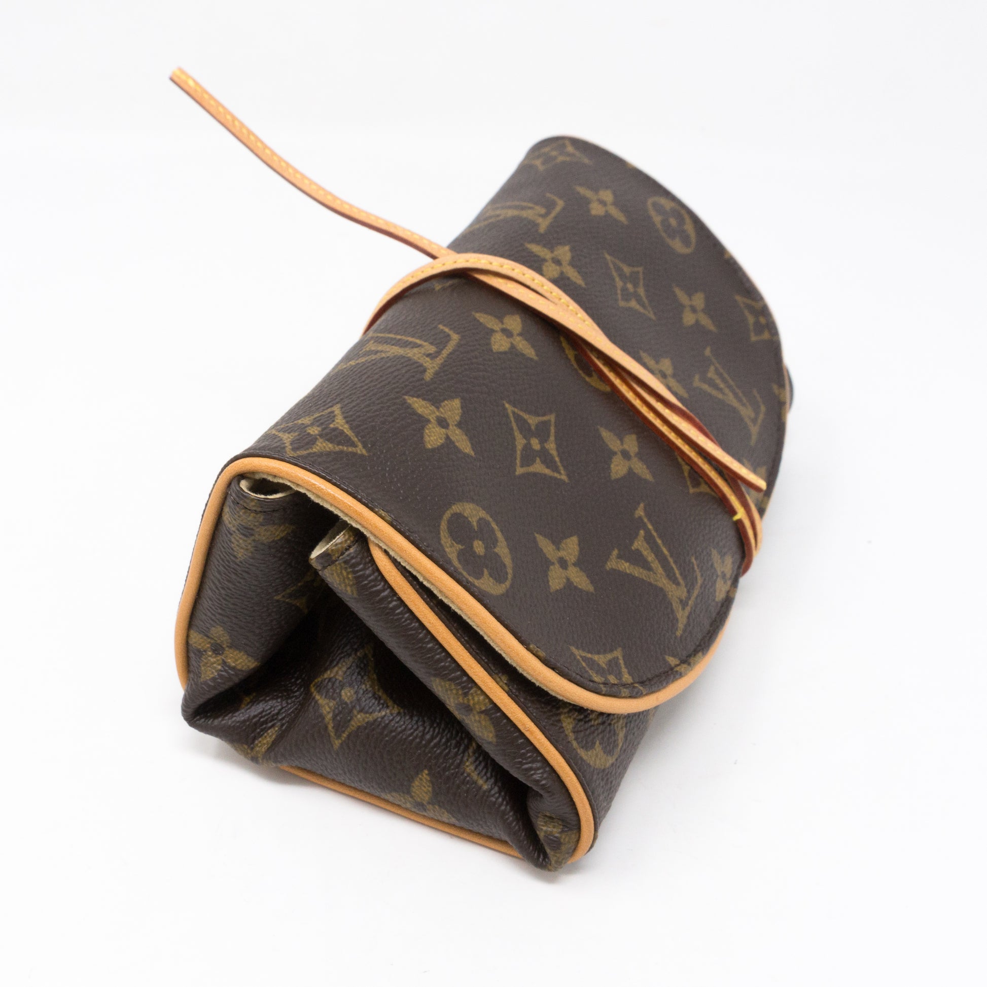 Louis Vuitton Monogram Canvas Folding Jewelry Roll Case Brown Cloth  ref.504438 - Joli Closet