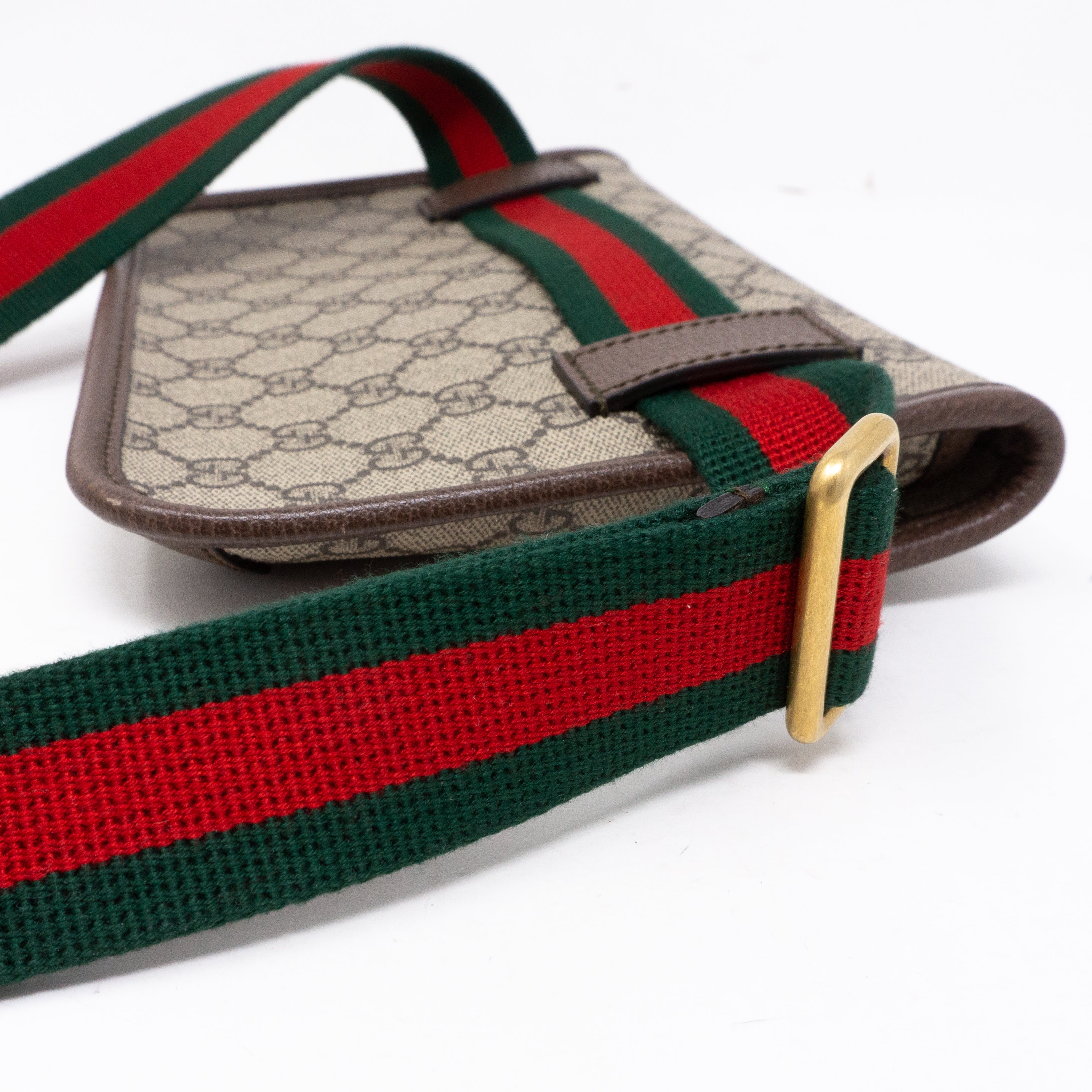 Gucci belt bag best sale red and green strap