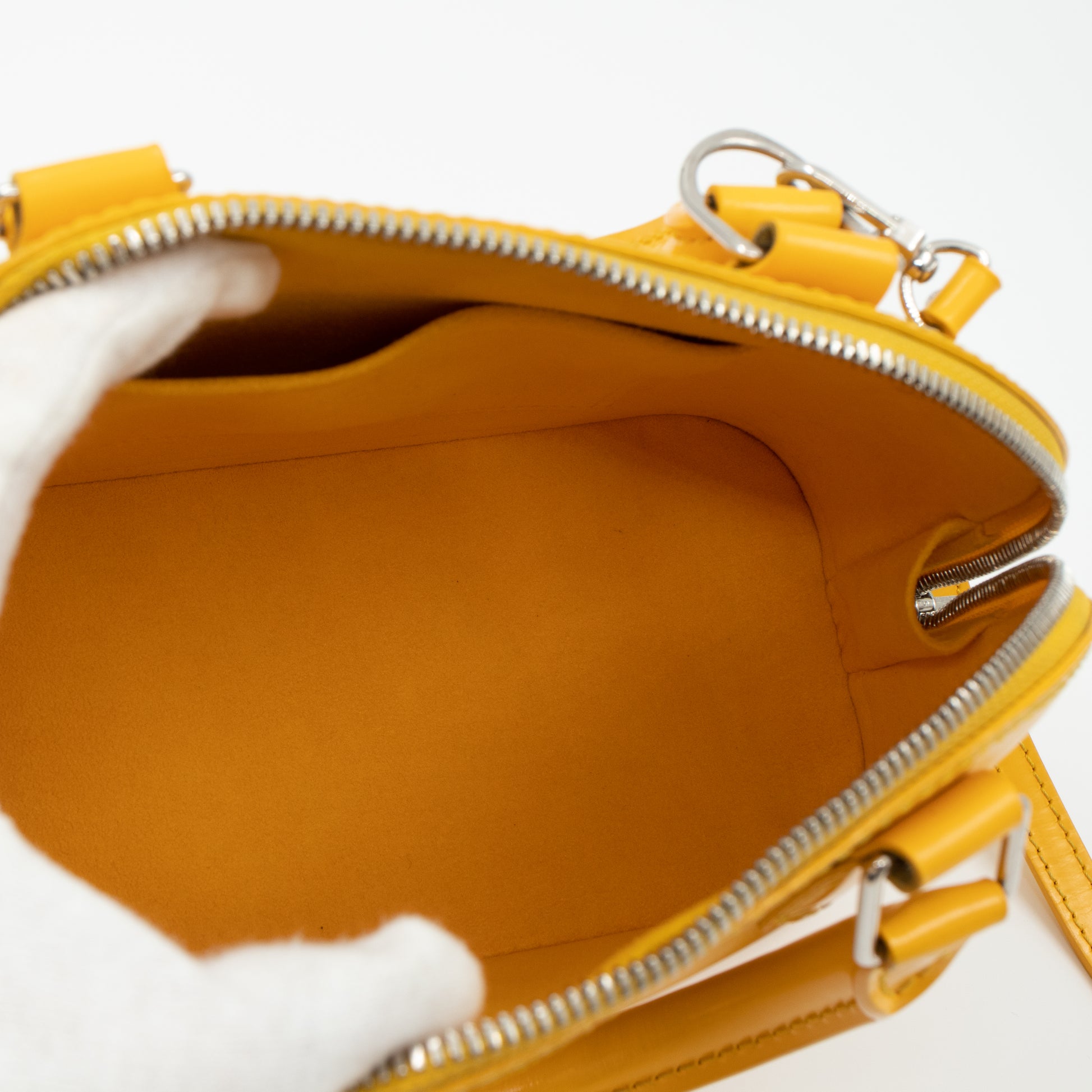 Alma bb leather handbag Louis Vuitton Yellow in Leather - 35049115