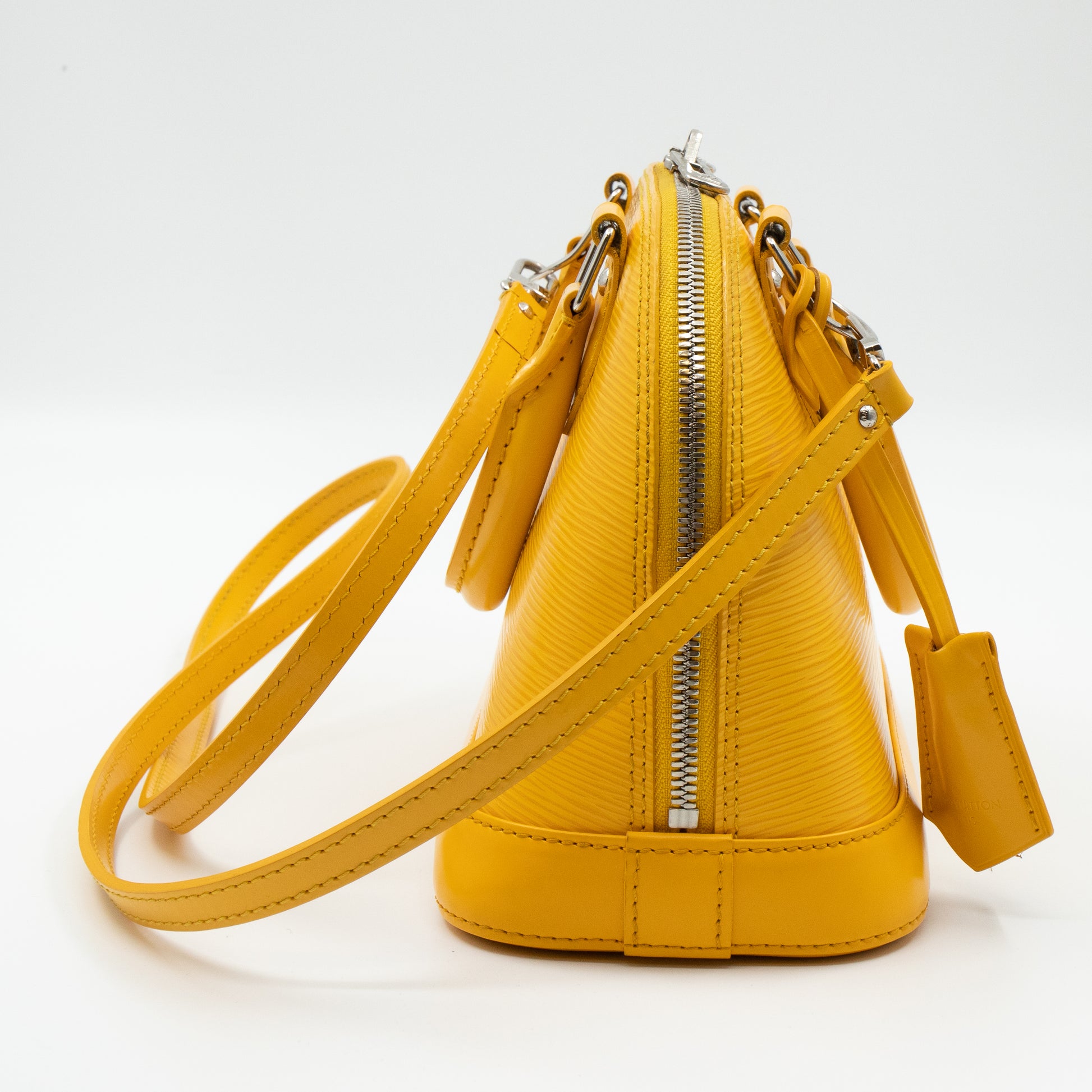 Alma leather handbag Louis Vuitton Yellow in Leather - 31441494
