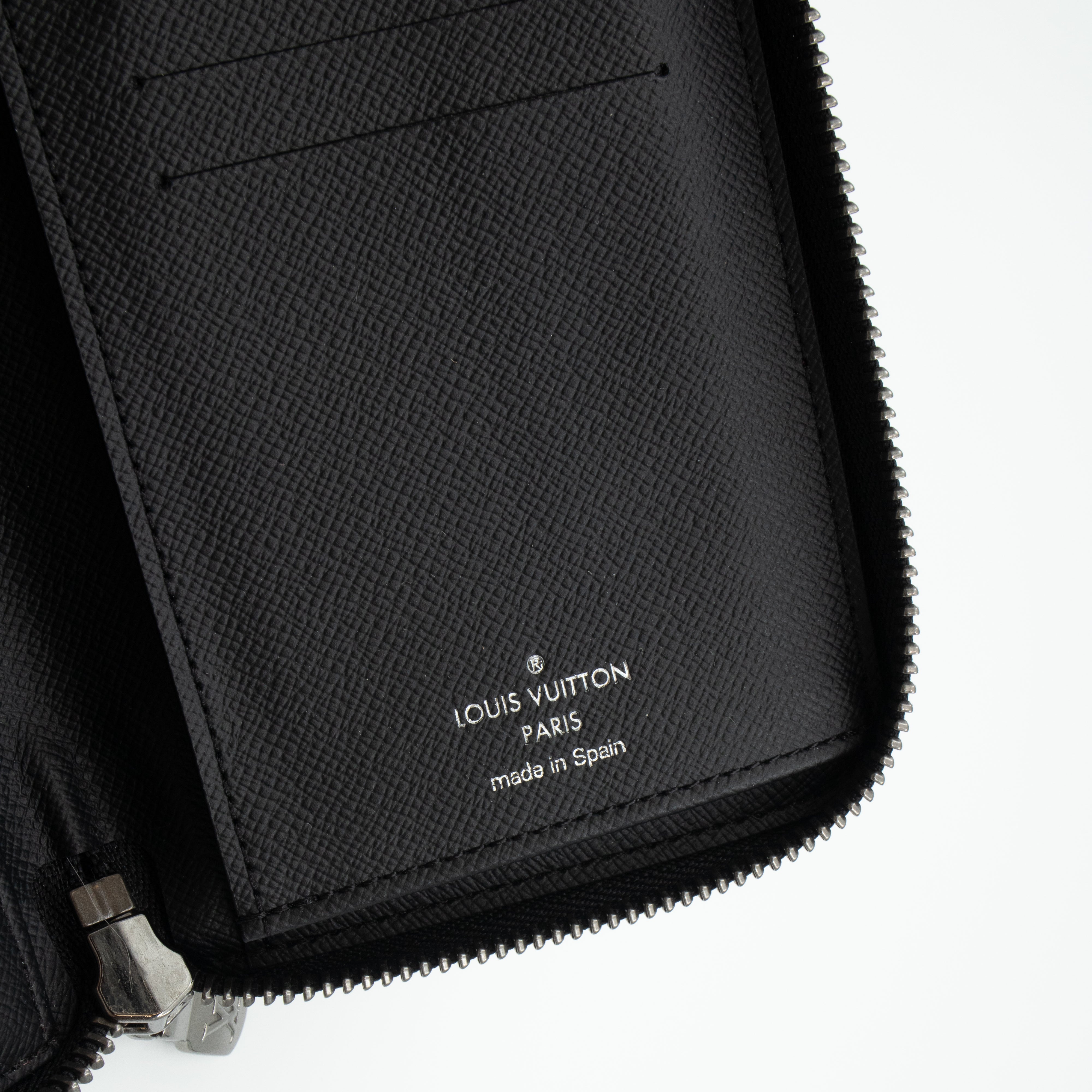 Zippy Vertical Wallet Monogram Eclipse