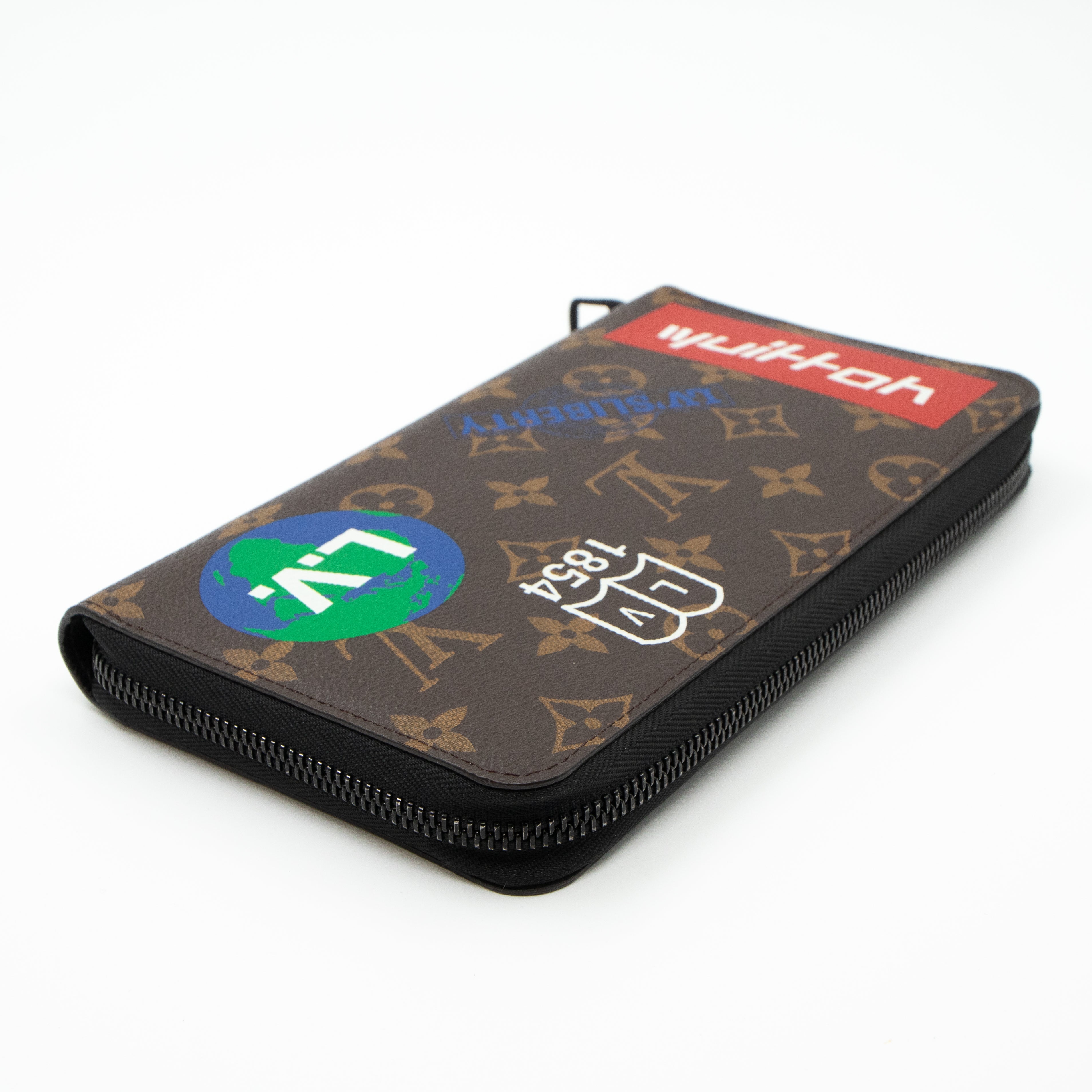 Zippy Organizer Wallet Monogram Logo Story
