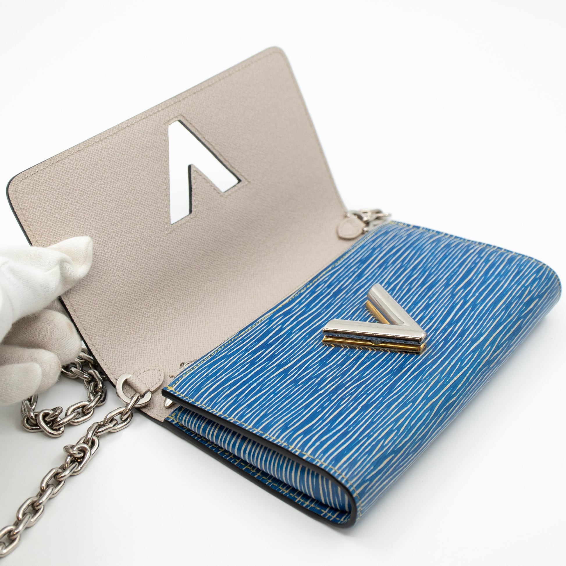 Shop Louis Vuitton EPI Twist wallet (M67510) by SkyNS