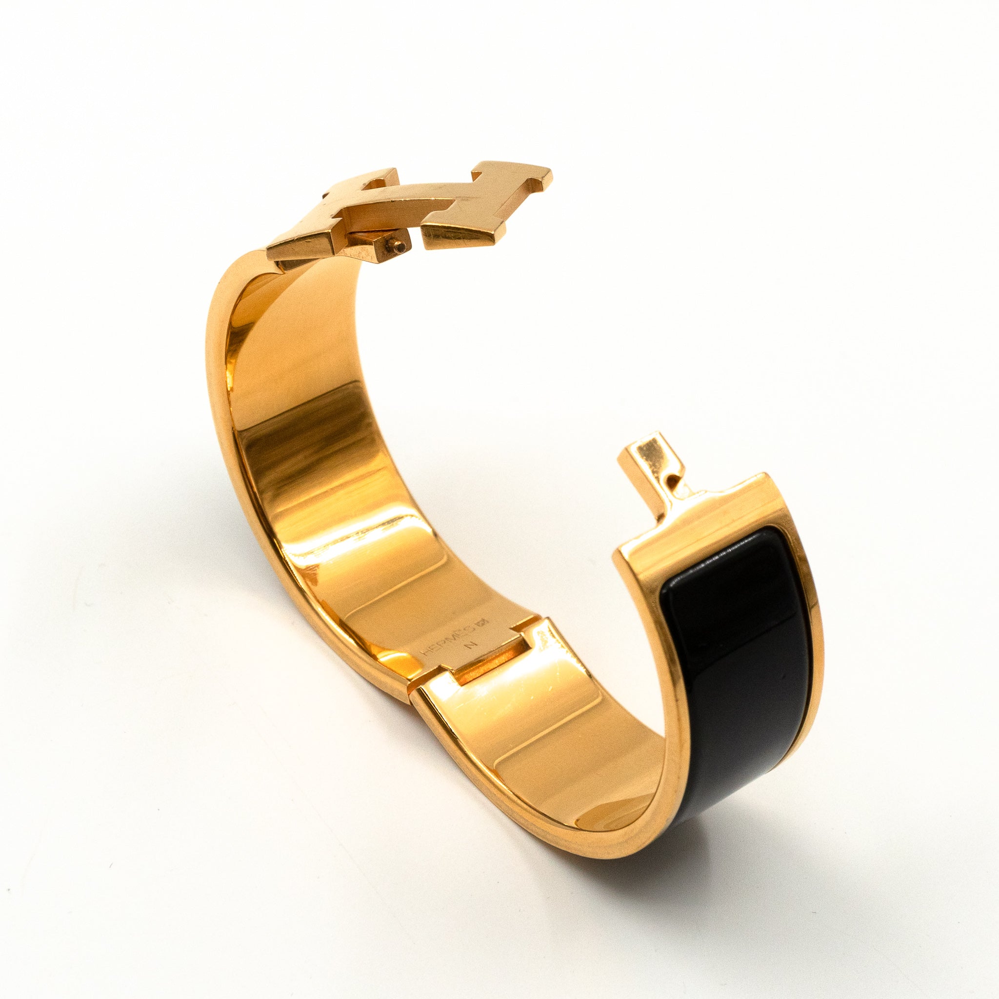 Clic h black and hot gold bracelet